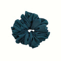 Oversized chiffon scrunchie, dark teal-blue ruffled flower shape