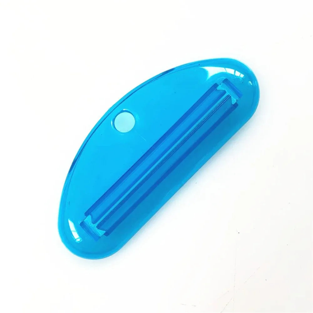 Toothpaste tube squeezer dispenser, blue oval with long ridged opening