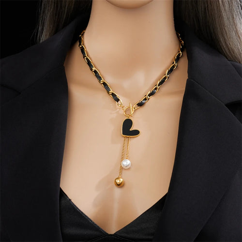 Gold-tone heart pendant necklace with pearl and gold ball dangle