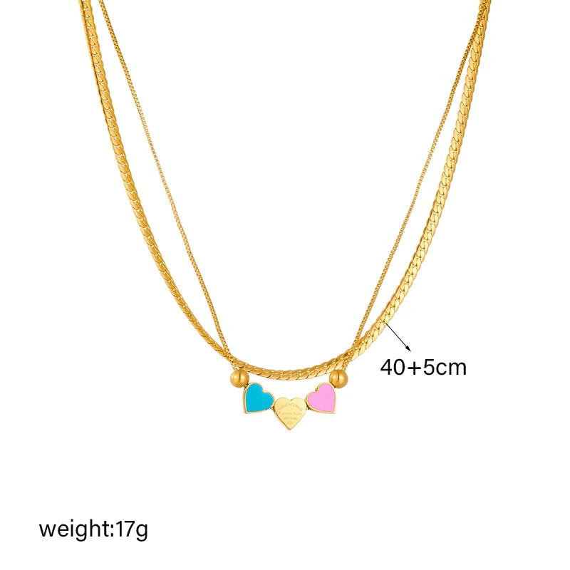 Gold double-layer heart necklace with blue and pink enamel heart charms