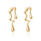 Gold-tone lava-drop stud earrings with elongated sculpted teardrop shape
