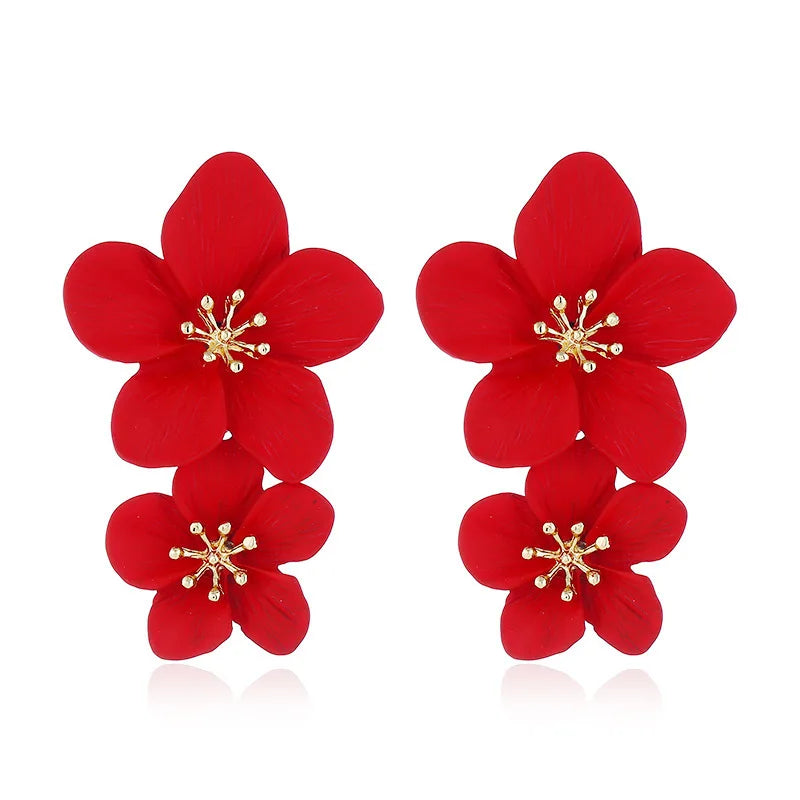 Red double-layer flower dangle earrings with gold-tone star centers