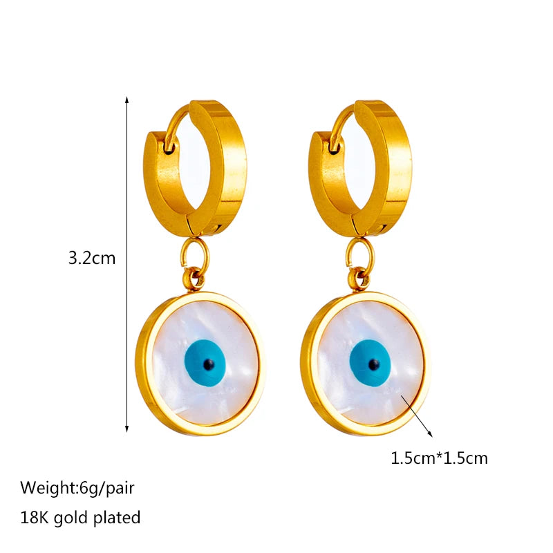 Gold hoop earrings with blue evil-eye round charm and white enamel ring
