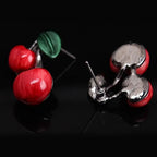 Cherry-themed earring studs: red cherry beads with green leaf accents, silver-tone backs