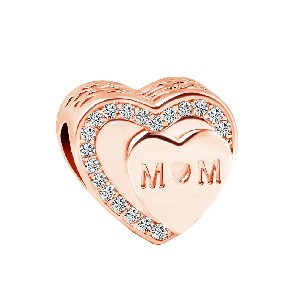 Rose gold heart charm bead with cubic zirconia halo and engraved heart center