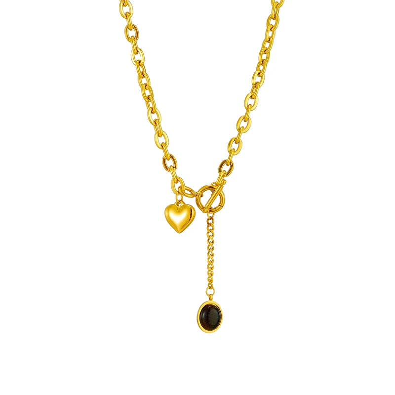 Heart pendant necklace with gold-tone chain and round black stone drop