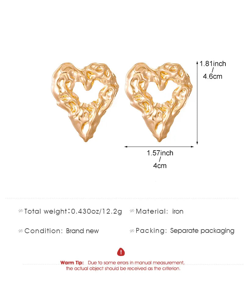 Gold heart drop earrings with a textured, wrinkled surface