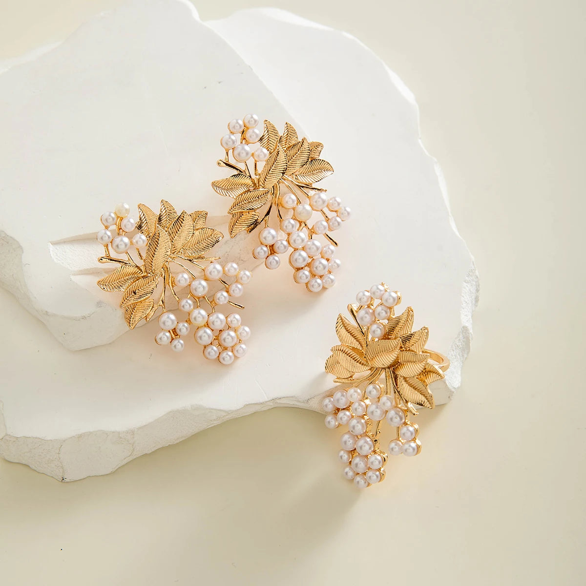 Pearl and gold-tone leaf cluster drop earrings