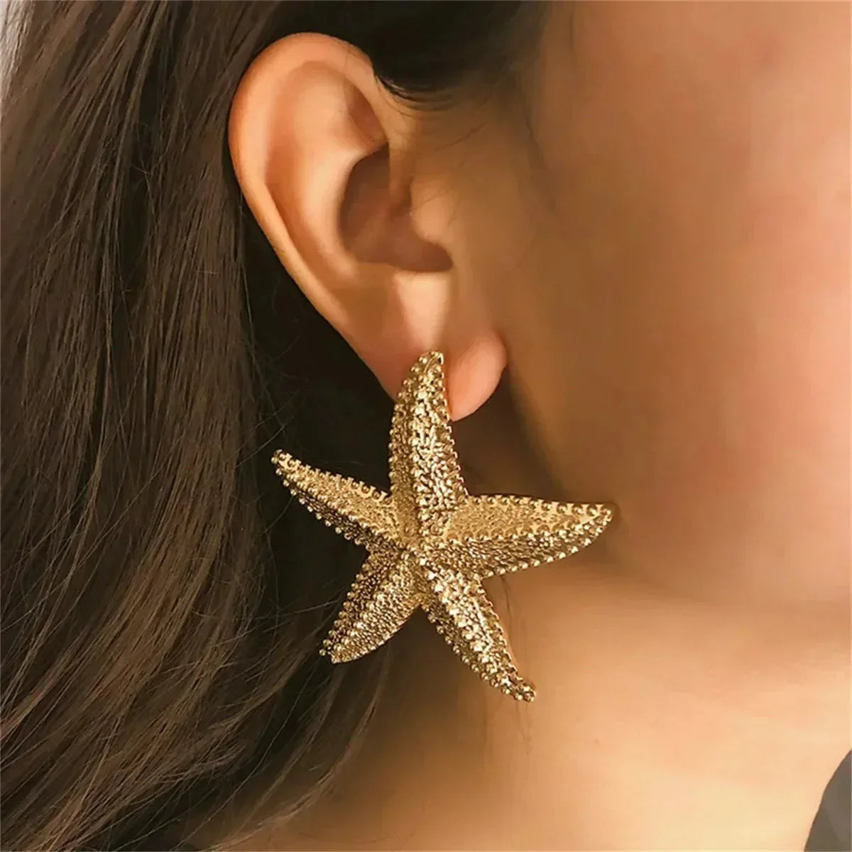 Boucles d'oreilles pendantes bohème à pompons — Étoile de mer et coquillage