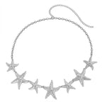 Silver-tone starfish waist belly chain with five starfish charms, flat lay