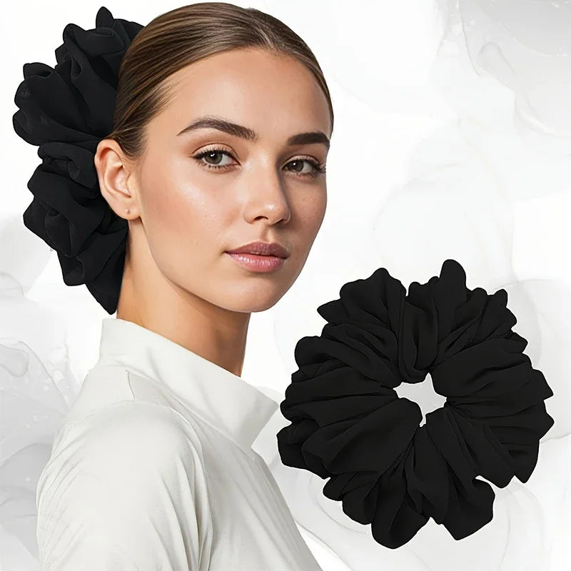 Oversized chiffon scrunchie in black, ruffled flower shape on hair