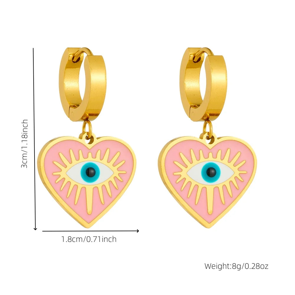 Gold-tone heart drop earrings with turquoise evil eye center
