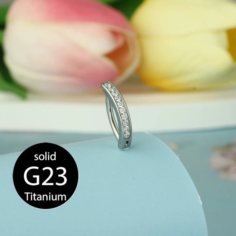 Belly button ring clicker with clear stone line in silver-tone hoop