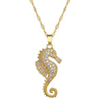 Gold-tone seahorse pendant necklace with rhinestone-studded seahorse charm