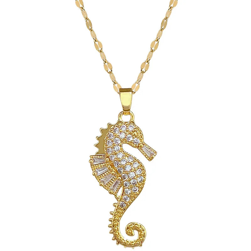 Gold-tone seahorse pendant necklace with rhinestone-studded seahorse charm