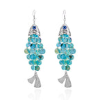 Koi fish earrings with silvery body, blue eye, turquoise disc scales, fan tail charm