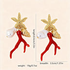 Star-and-figure resin earrings with red dancers and white pearls; size shown