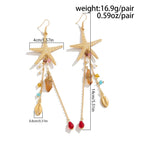 Boucles d'oreilles pendantes bohème à pompons — Étoile de mer et coquillage