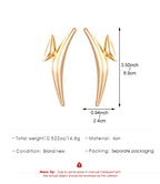 Gold-tone curved bar drop earrings with small pointed end accents