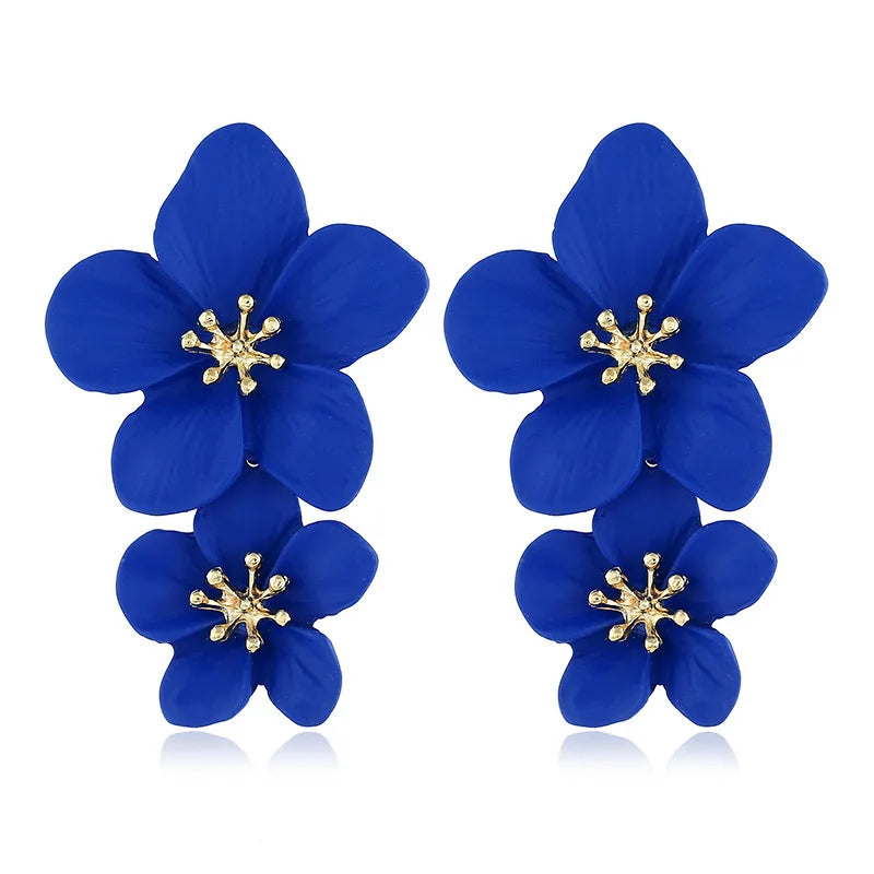 Pink double-layer flower dangle earrings with gold-tone star centers