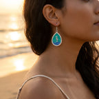 Teardrop seahorse shell earrings with green and blue enamel, silver-tone outline, dangle