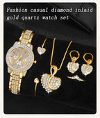 Gold watch set with rhinestone details; heart pendant necklace, earrings, and rings