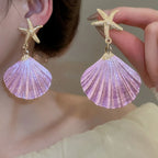 Starfish shell dangle earrings with gold starfish and lilac scallop shell drops