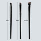 Eyeliner and eyebrow makeup brushes, three black handles with copper-toned bristles