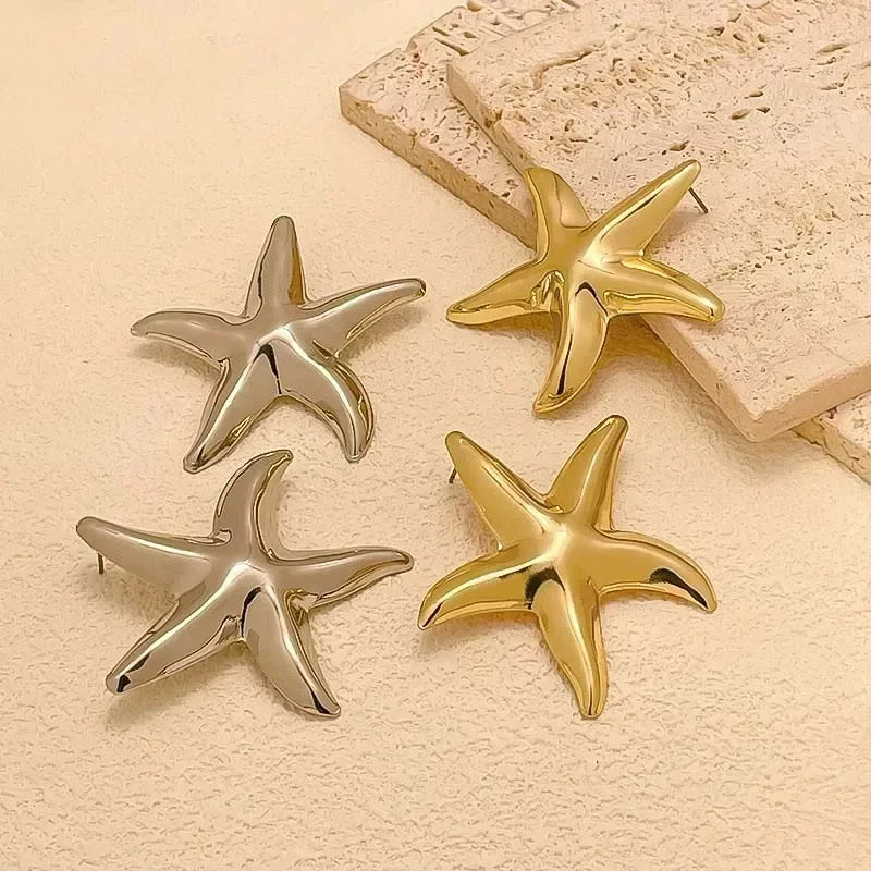 Boucles d'oreilles pendantes bohème à pompons — Étoile de mer et coquillage