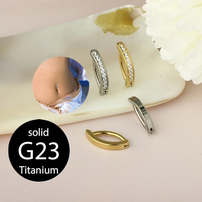 Titanium belly button ring clicker with jeweled hinged hoop and teardrop charm, gold and silver