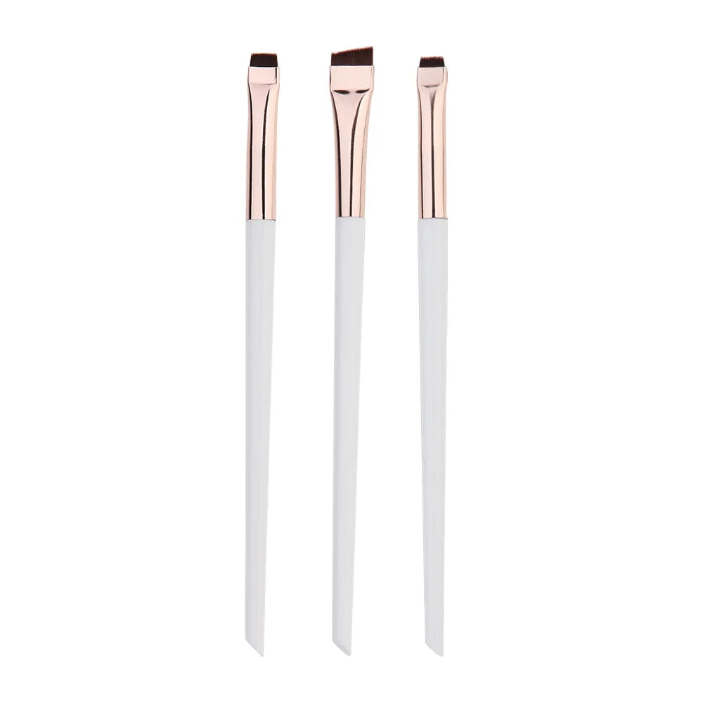 Eyeliner & eyebrow brush set with three brushes, white handles and rose-gold bristles