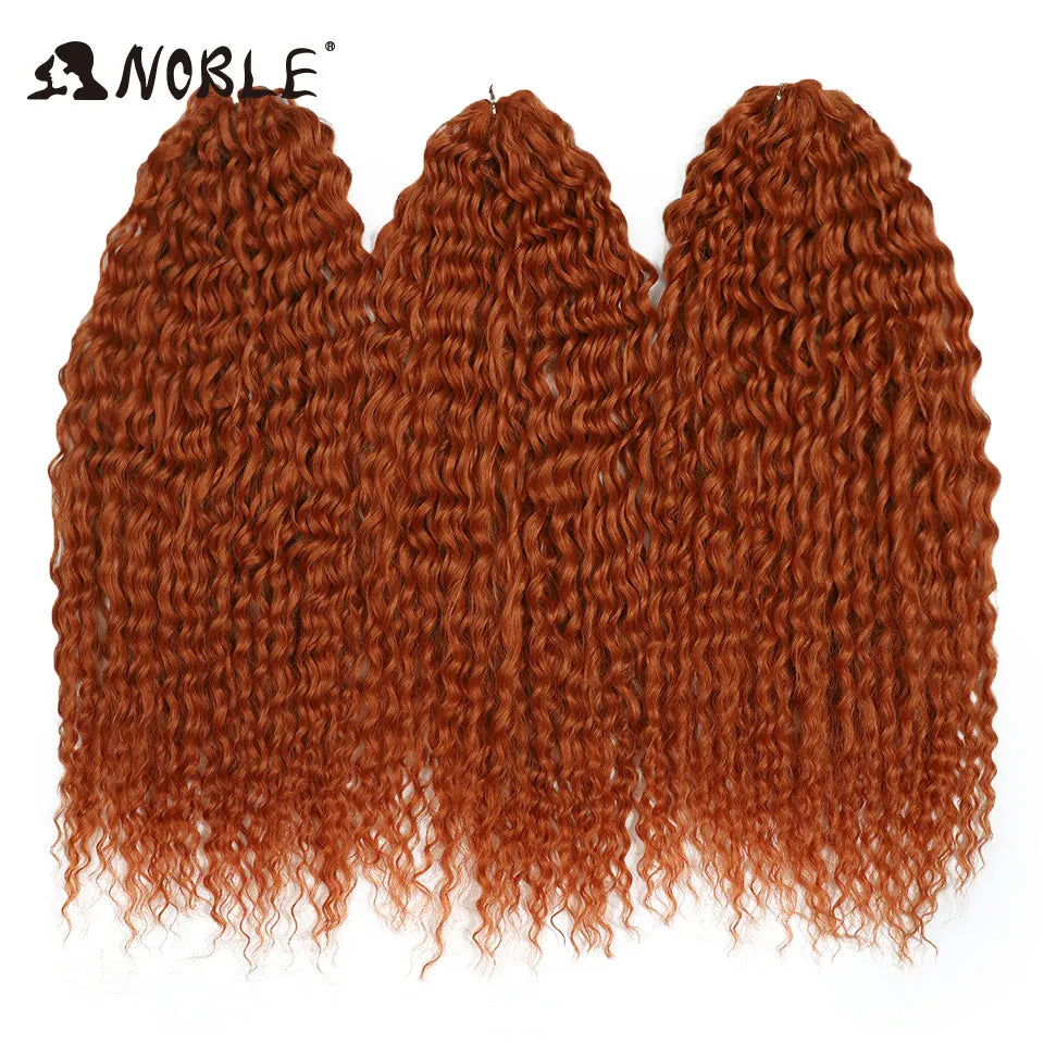 Synthetic crochet braids with water-wave curls, auburn orange to lighter ombre