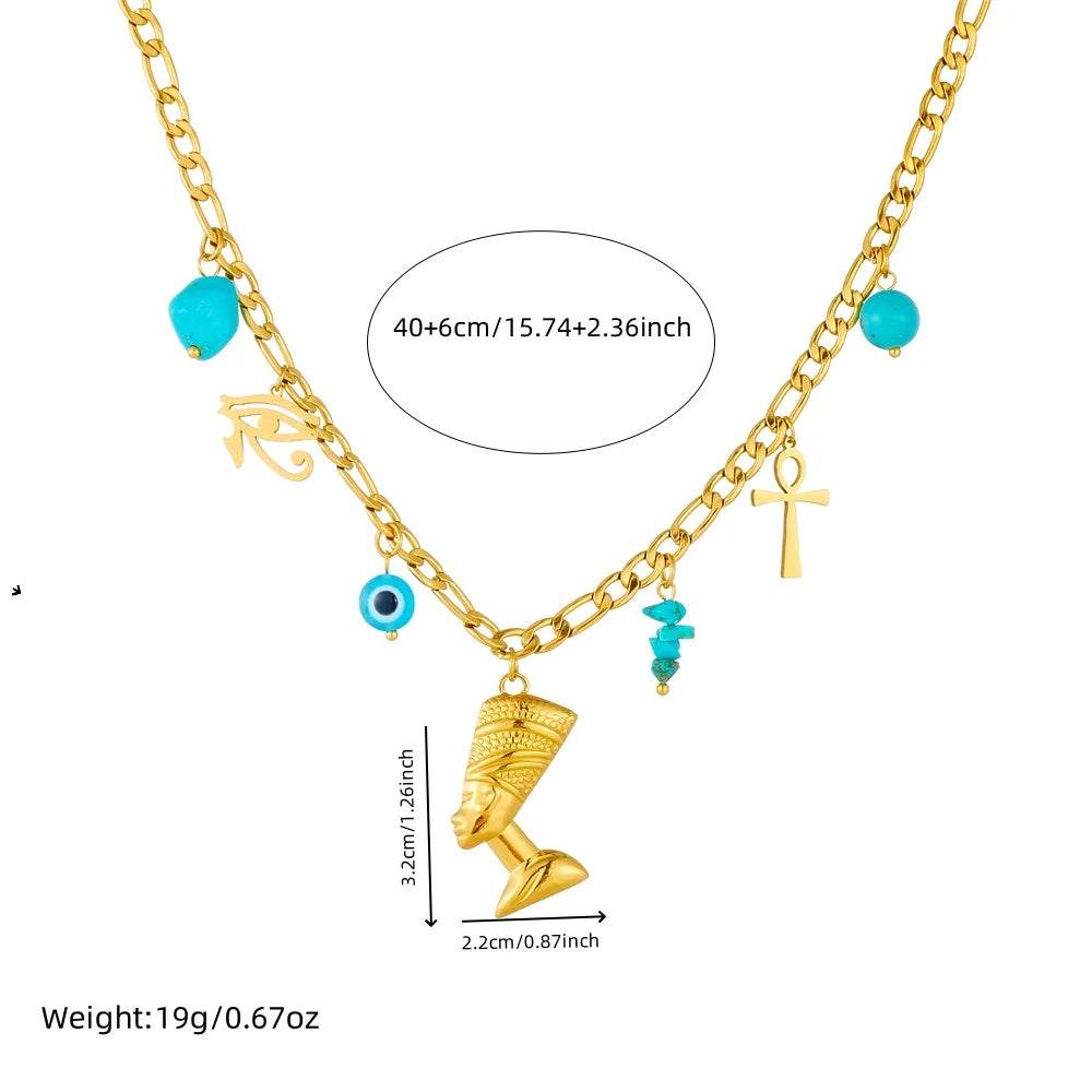 Gold-tone multi-pendant necklace with turquoise beads and evil-eye, cross, bell charms