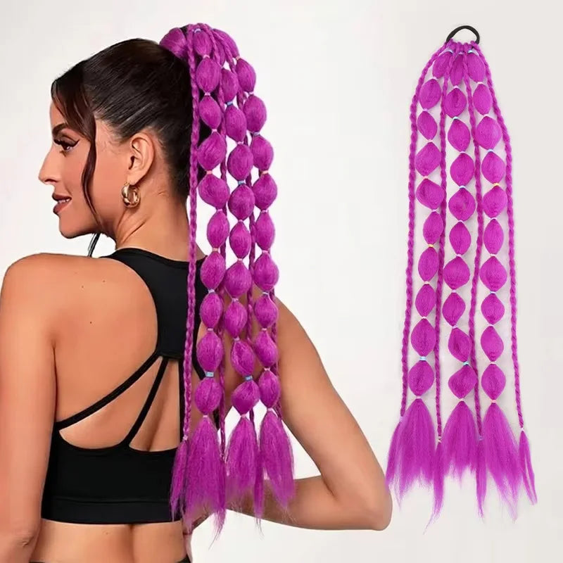 Fuchsia bubble braid ponytail extension with lighter pink ombre tips, elastic loop.