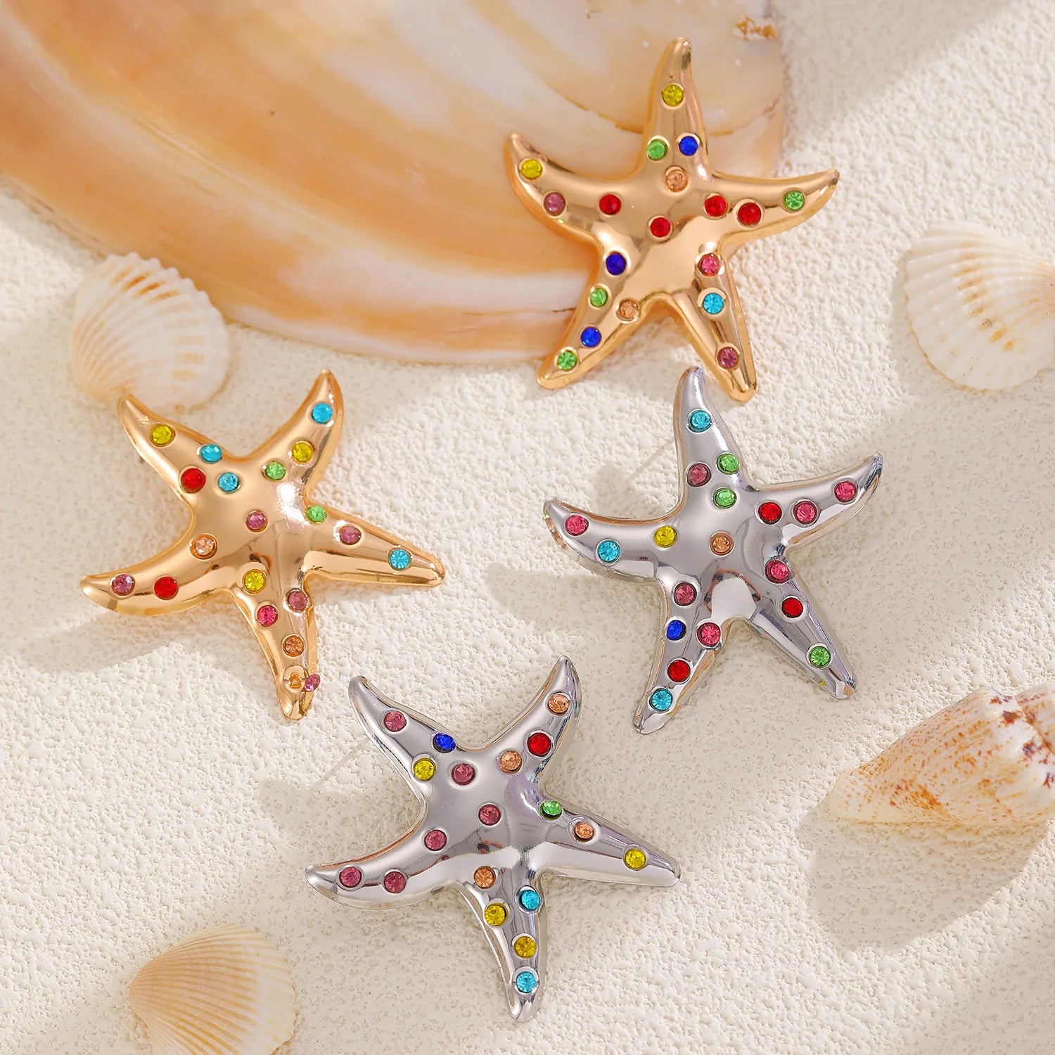 Set of starfish stud earrings with multicolor rhinestones in gold and silver tones