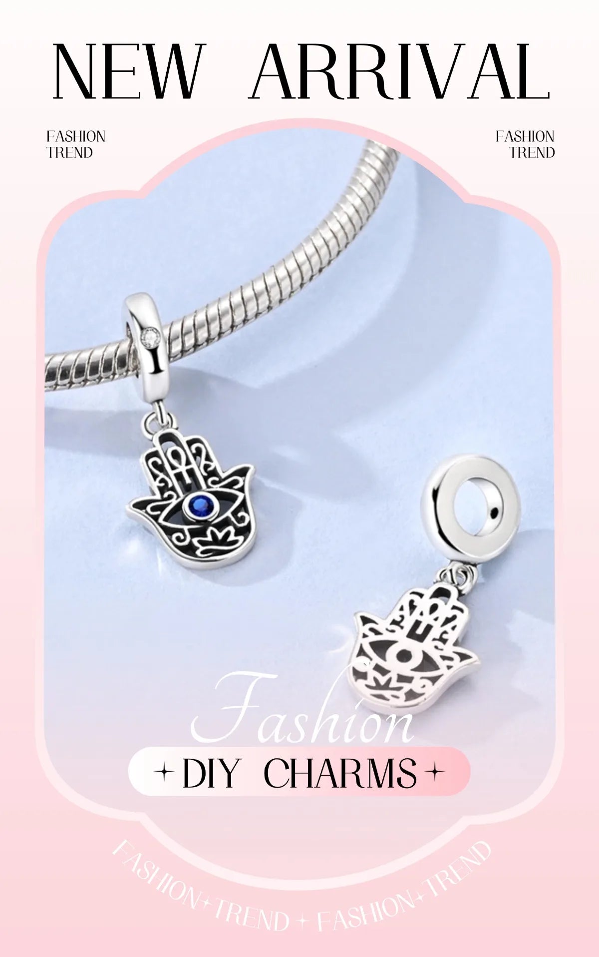 Sterling silver charm with blue evil-eye center and hand-shaped pendant