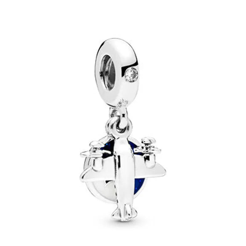 Silver airplane charm bead with small blue wing stripe and clear accent details