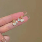 Boucles d'oreilles pendantes bohème à pompons — Étoile de mer et coquillage