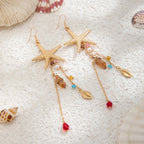 Boucles d'oreilles pendantes bohème à pompons — Étoile de mer et coquillage