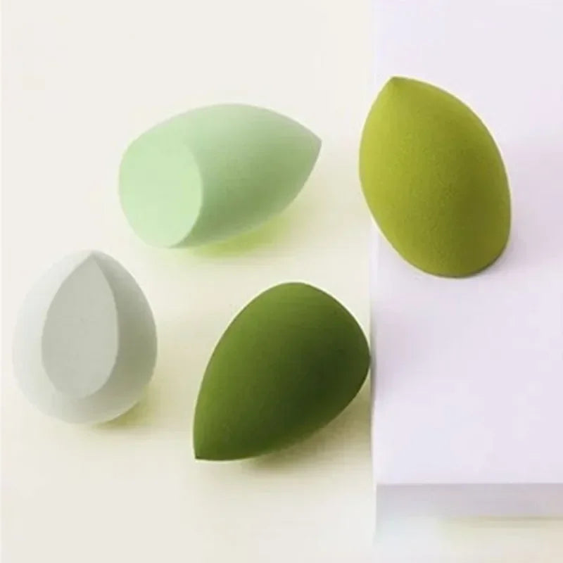 4-piece makeup sponge set with light green and dark green teardrop sponges