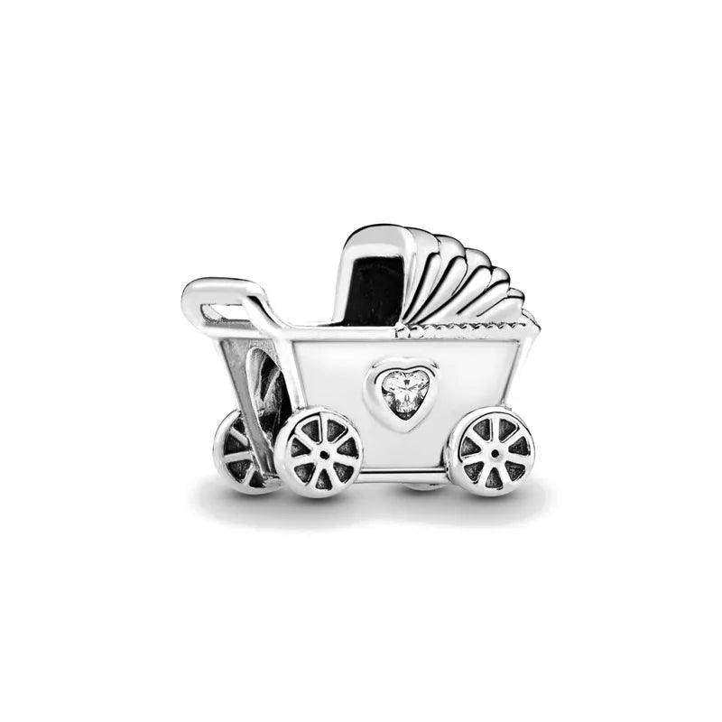 Sterling silver wagon charm bead with heart and wheel details