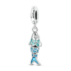 Hamsa charm bead with layered teal and blue enamel hand details