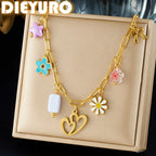 Gold enamel pendant necklace with heart charm and pink, blue, and white flower pendants