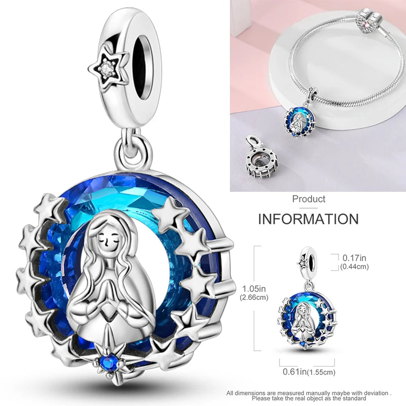 Sterling silver charm with blue crystal angel and star accents