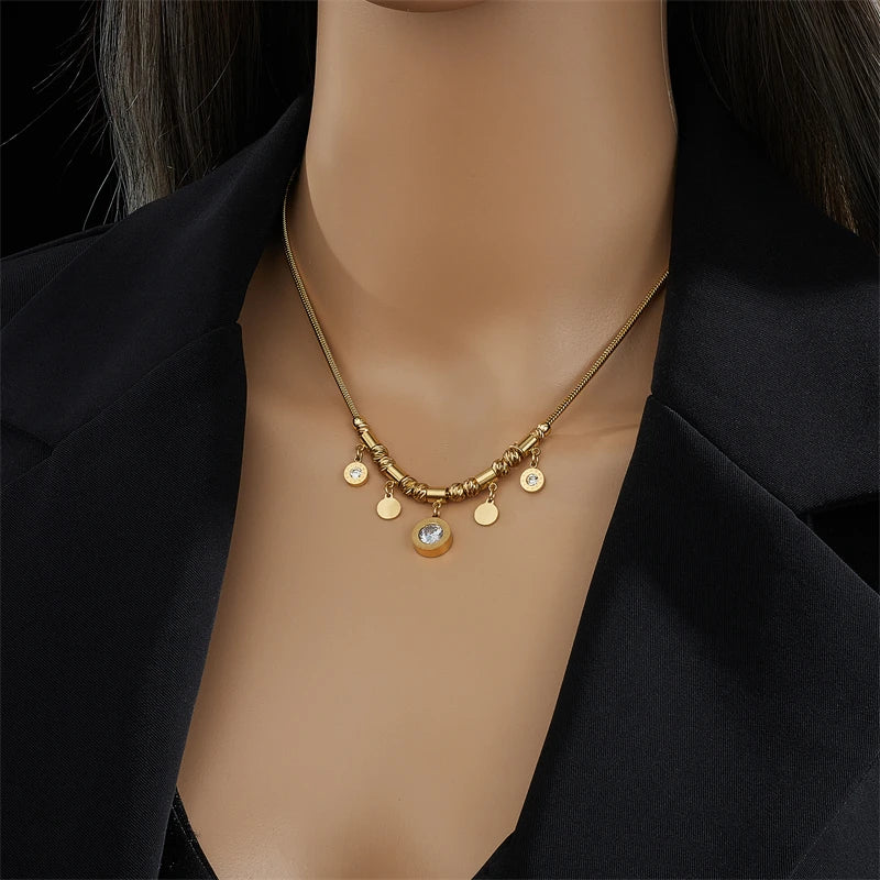 Zircon pendant necklace with gold-tone chain and round charm pendants