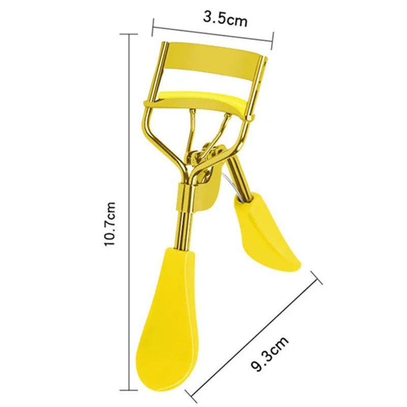 Yellow eyelash curler tool with curved handle and angled top pad