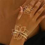 Gold hollow flower ring and cuff bracelet set, layered openwork petals on fingers