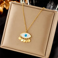 Eye pendant choker necklace, gold chain with blue evil-eye charm and hanging gold drops