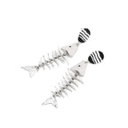 Silver-tone fishbone dangle earrings with black-and-white striped round tops and fish charms