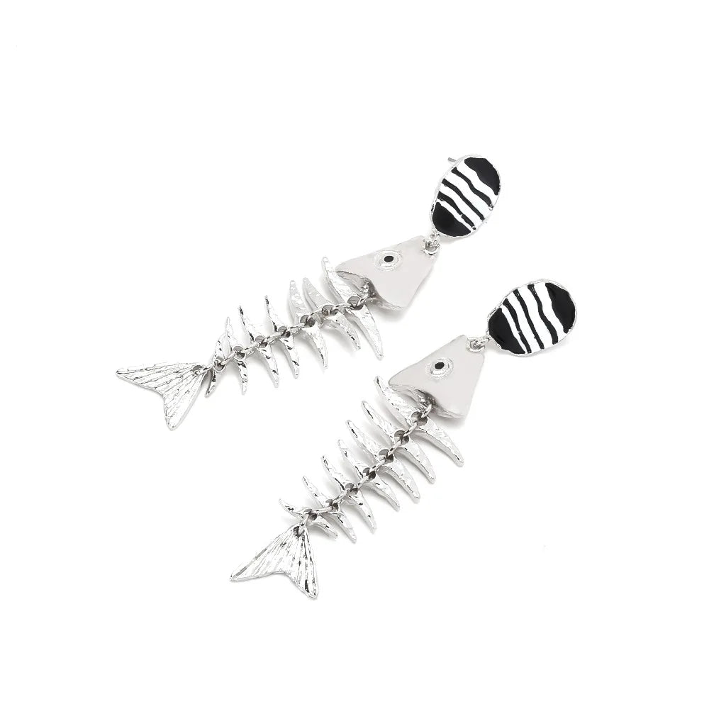 Silver-tone fishbone dangle earrings with black-and-white striped round tops and fish charms
